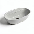 Lavabo ovale en résine minérale gris clair 60 x 35 x 15cm pour salle de bain